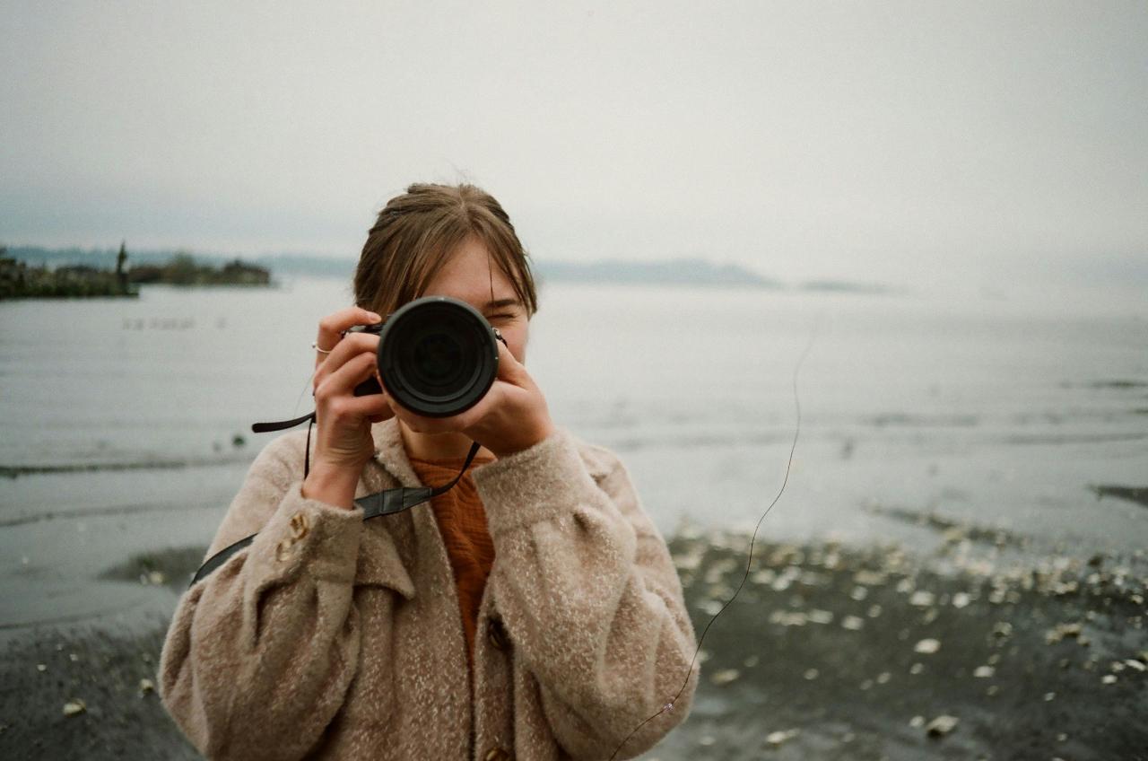 Woman Taking Photo on Beach · Free Stock Photo